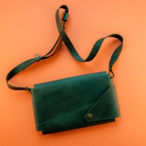 green leather clutch